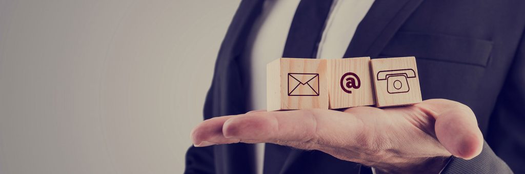 Contact Us Timber Blocks on a Hand